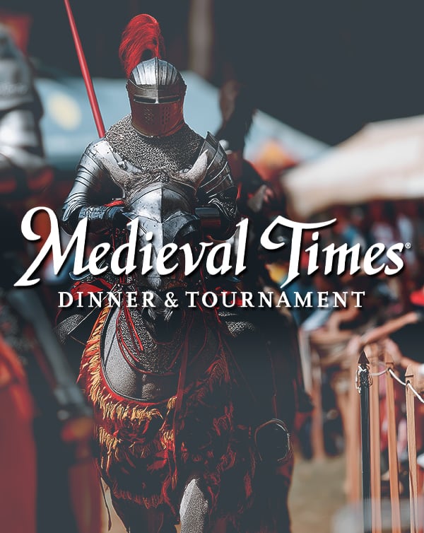 Photo of Medieval Times knights jousting on horses